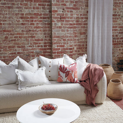 linen cushion with folral print in pinks; rose dust, desert rose, musk, apricot and white