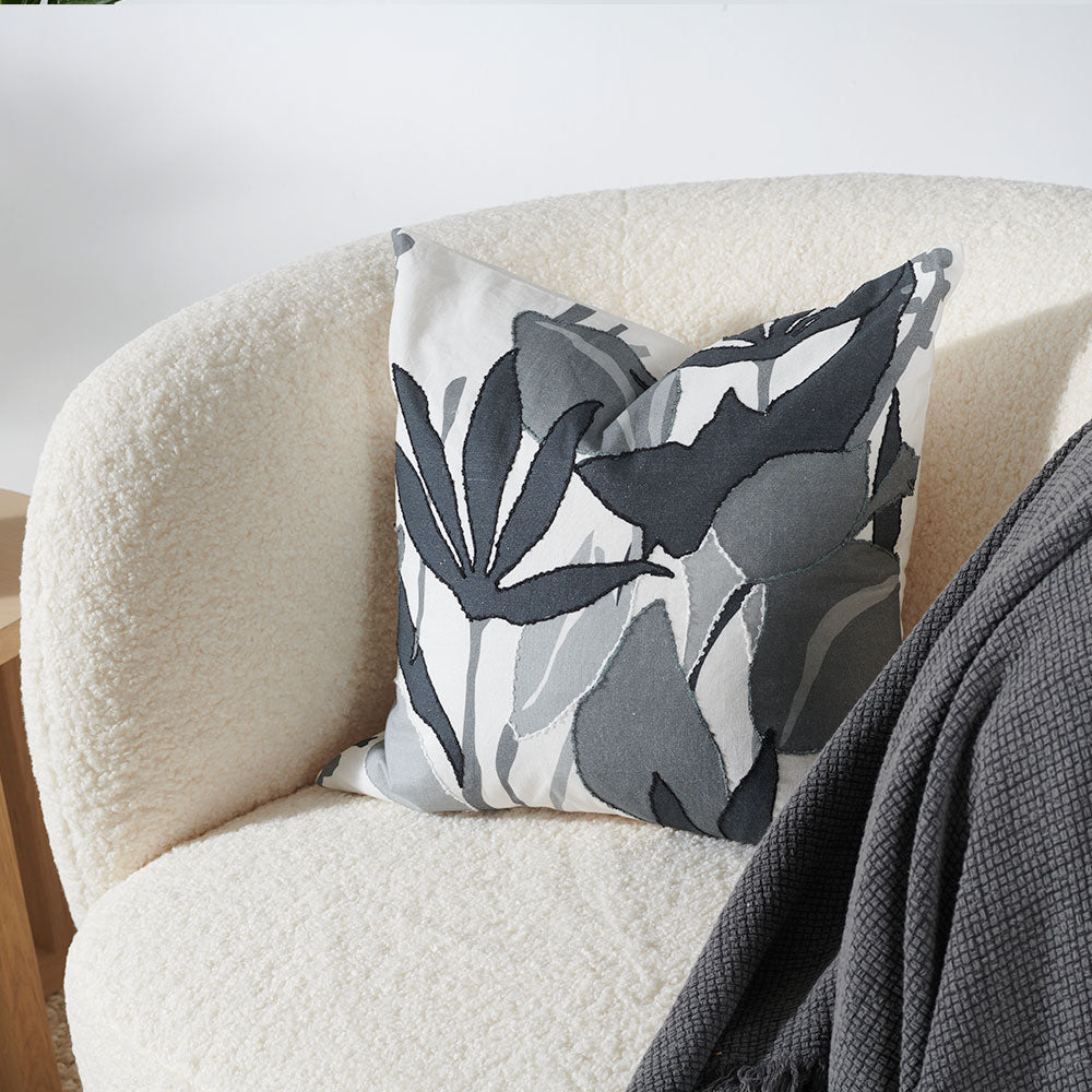 linen cushion with folral print in black, grey and white