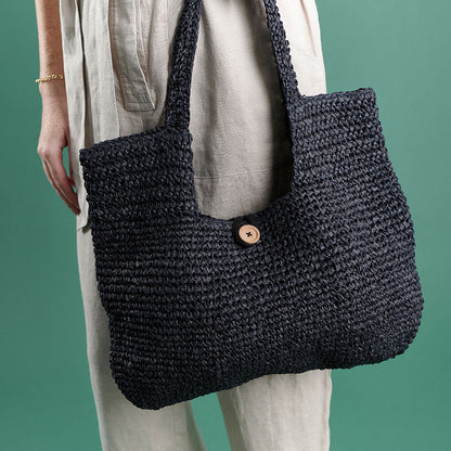 beach bag with button enclosure and cotton lining black