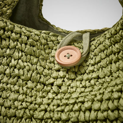 beach bag with button enclosure and cotton lining green