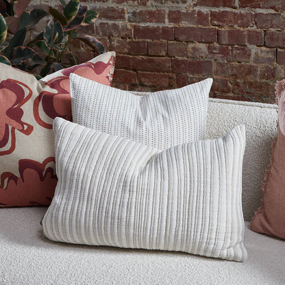 natural and white stripped cushion in a soft ribbed material