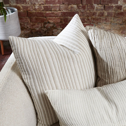 natural and white stripped cushion in a soft ribbed material