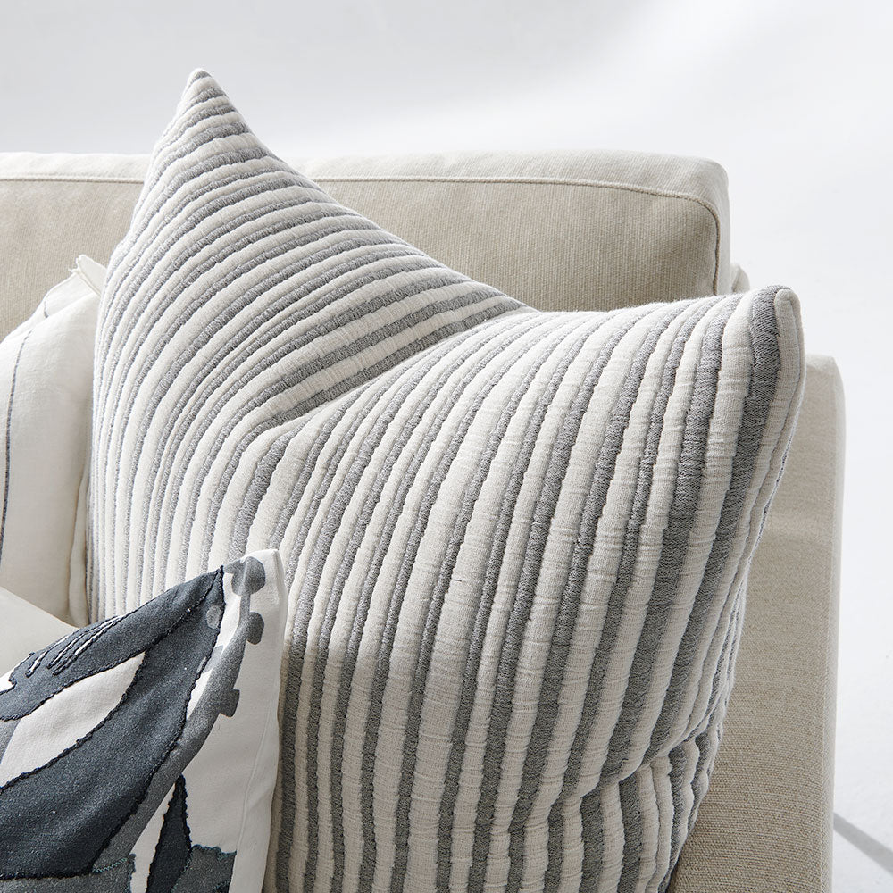 slate and white stripped cushion in a soft ribbed material