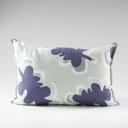 100% linen cushion in a sea mist and navy leaf abstract pattern and a contrast stitch feature