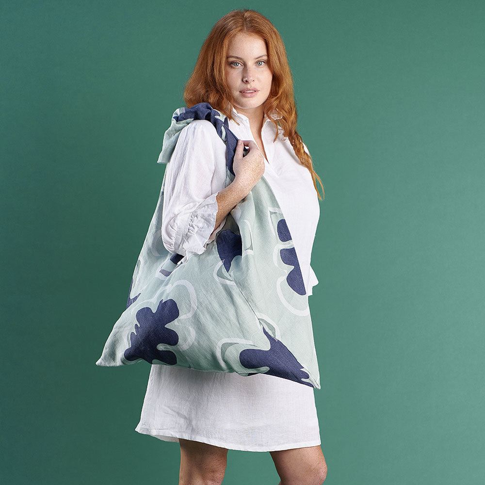 large linen beach bag in navy and seamist print gidget