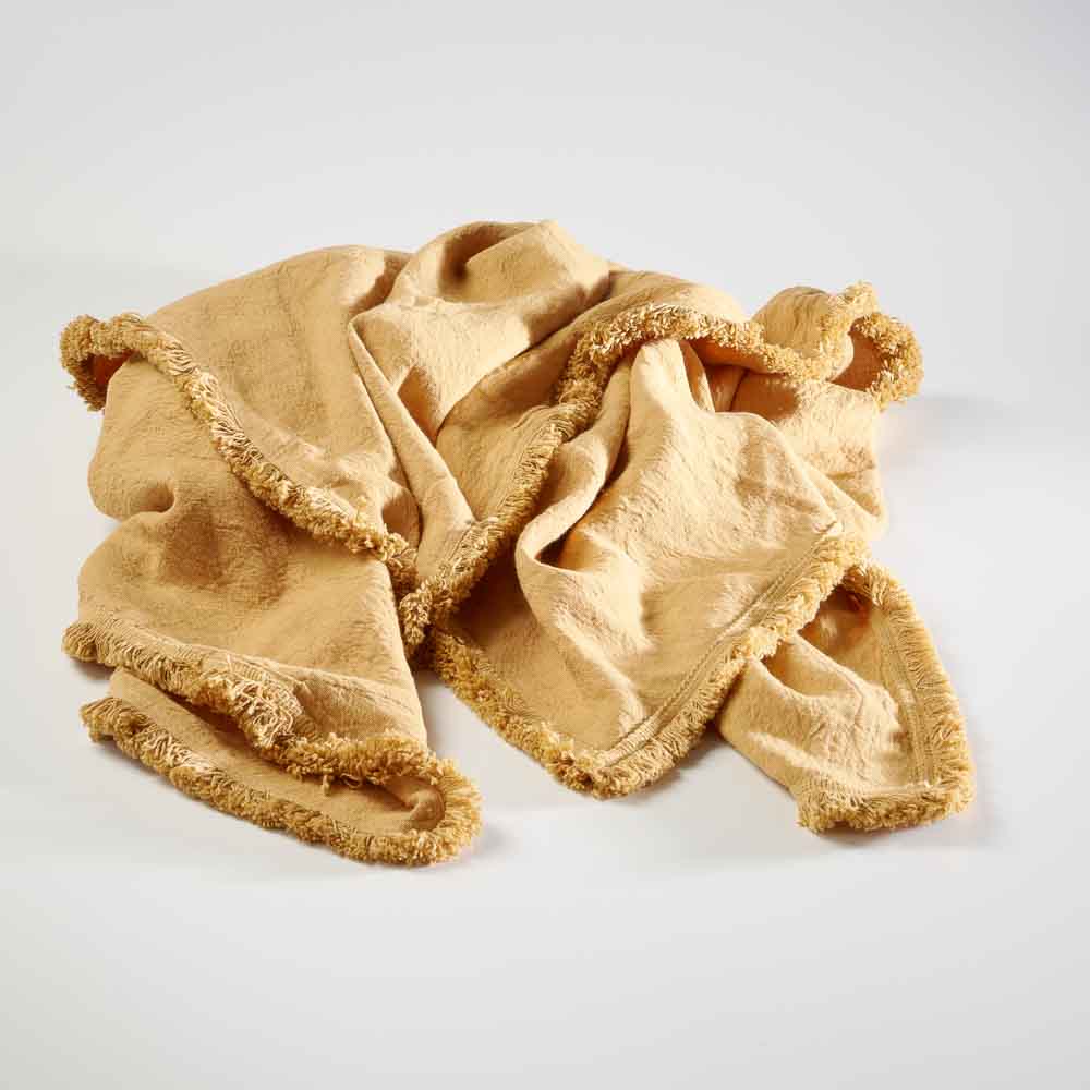 100% linen throw with fringe edge feature in turmeric, golden yellow colour