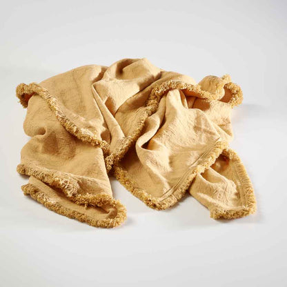 100% linen throw with fringe edge feature in turmeric, golden yellow colour