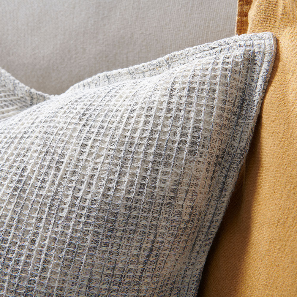 woven textrued cushion in grey