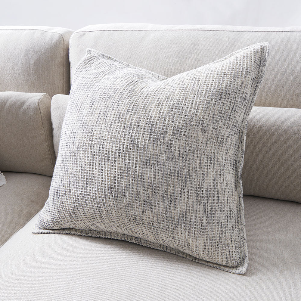 woven textrued cushion in grey