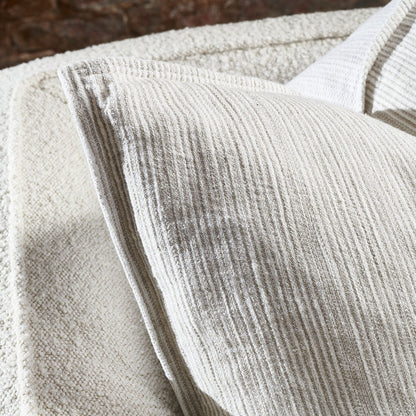 100% linen cushion in a natural and white faint stripe pattern which is reversible