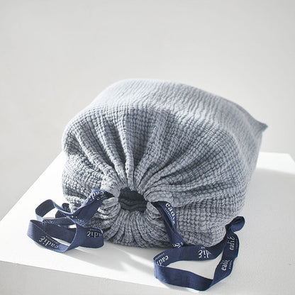 steel blue duvet set with contrast stitching, lettuce edge and wooden button feature