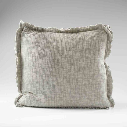 pistachio coloured cushion in a soft fabric with a double flange design and contrast stitching detail