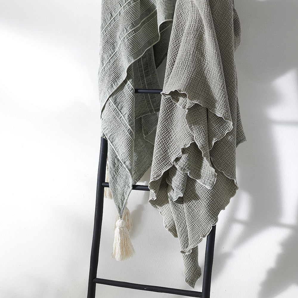 pistachio throw lettuce edge trim and contrast stitching feature