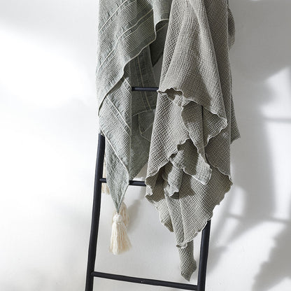 pistachio throw lettuce edge trim and contrast stitching feature