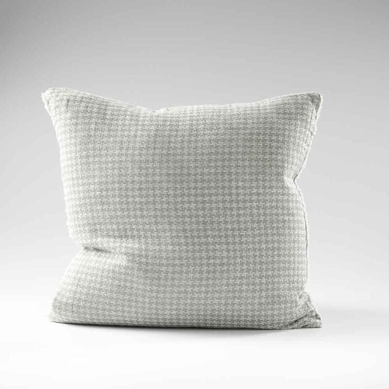 houndstooth pattern linen cushion in pistachio with frayed edge feature