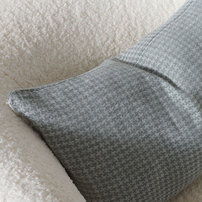 houndstooth pattern linen cushion in pistachio with frayed edge feature