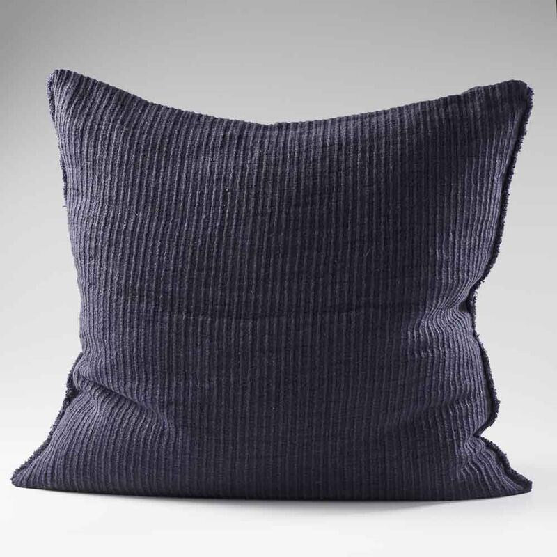 navy blue ribbed linen cushion with wooden button closure feature and frayed edging