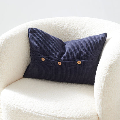 navy blue ribbed linen cushion with wooden button closure feature and frayed edging