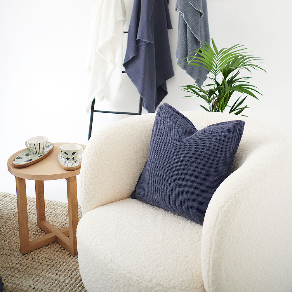 cotton waffle textured cushion in navy blue