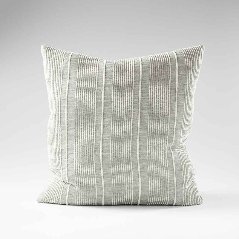 pistachio linen cushion with a white stripe feature 