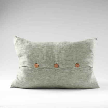pistachio linen cushion with wooden button feature