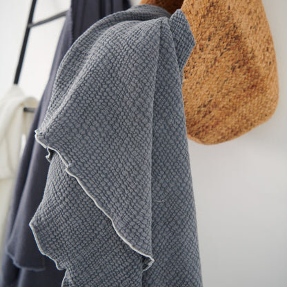 steel blue throw lettuce edge trim and contrast stitching feature