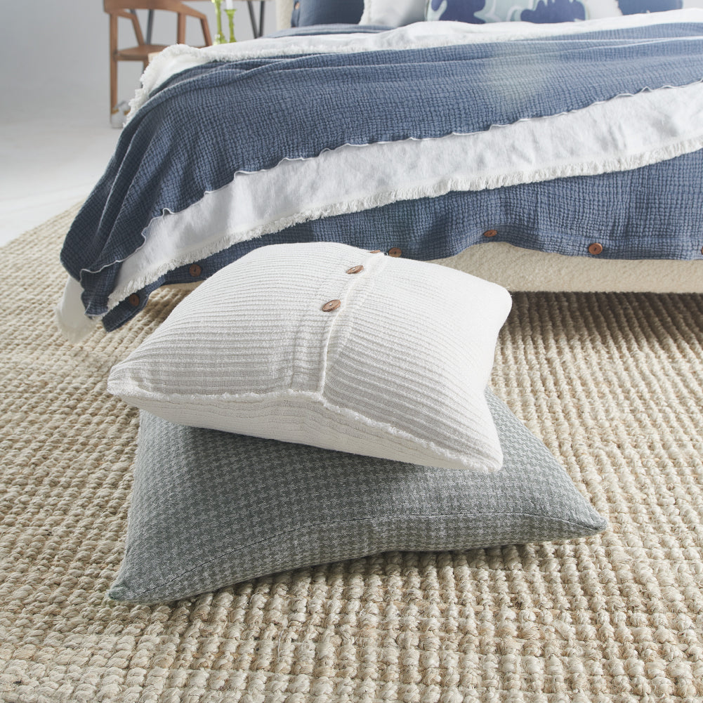 houndstooth pattern linen cushion in pistachio with frayed edge feature