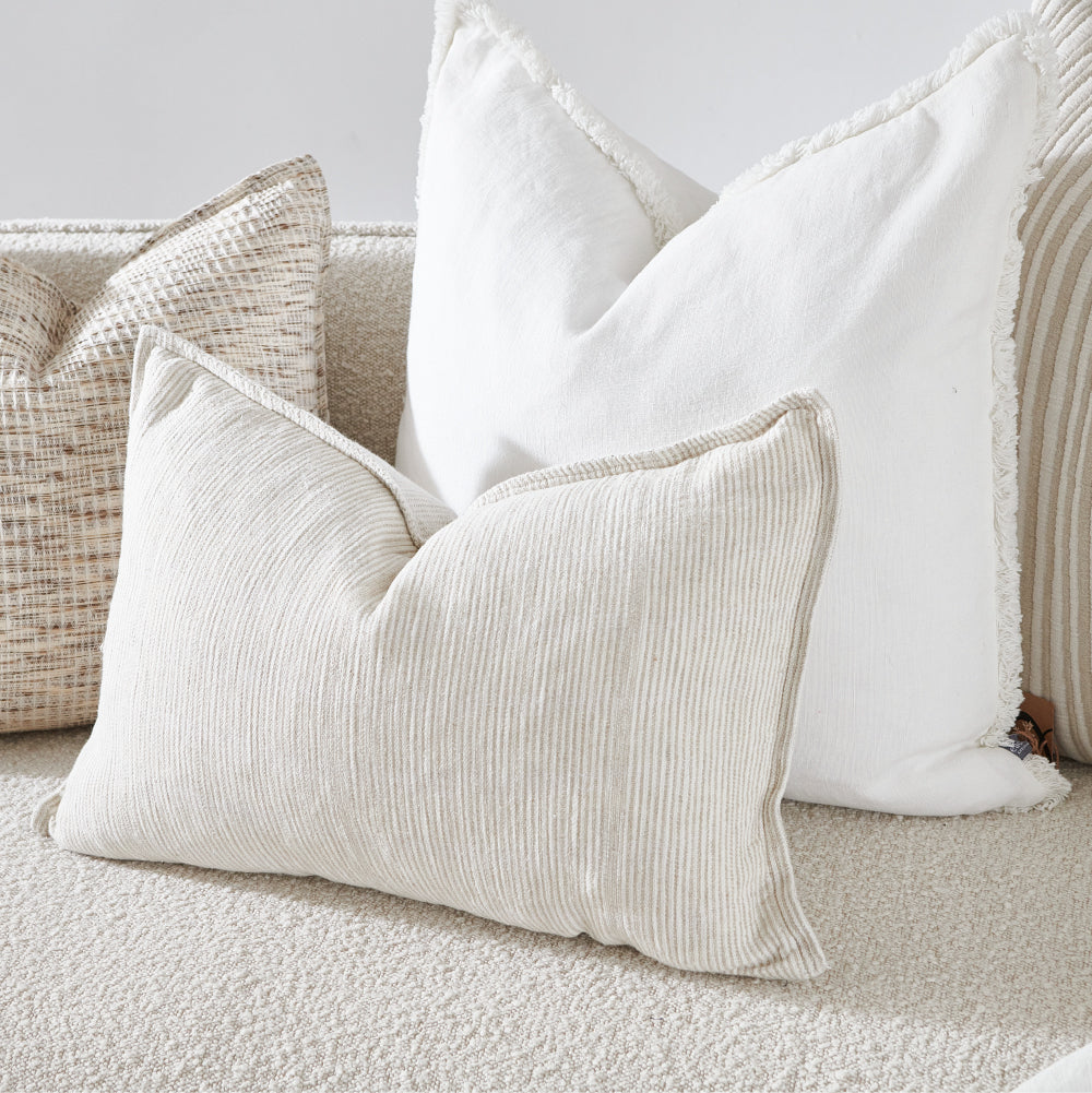 100% linen cushion in a natural and white faint stripe pattern which is reversible