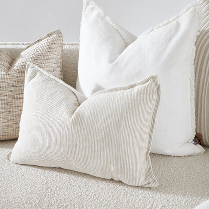 100% linen cushion in a natural and white faint stripe pattern which is reversible